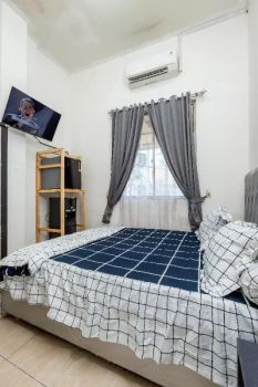 Kost pasutri dengan kamar luas