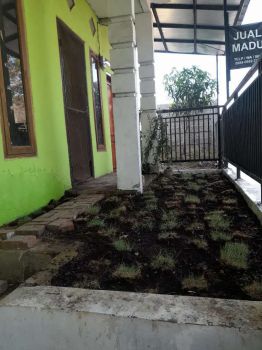 RUMAH DIPERTIGAAN UNTUK USAHA