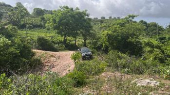 Tanah pinggir jalan raya view laut di Areguling