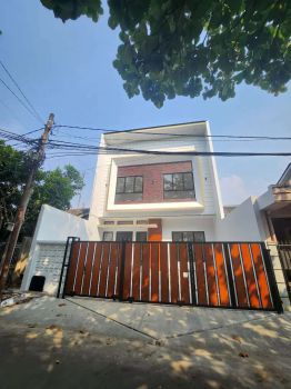 DIJUAL RUMAH CANTIK KONDISI BARU SIAP HUNI GRIYA LOKA FREE KITCHENSET