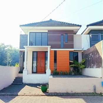 Rumah modern dijual di dau strategis nol jalan