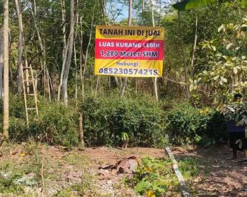 Tanah belakang perumahan