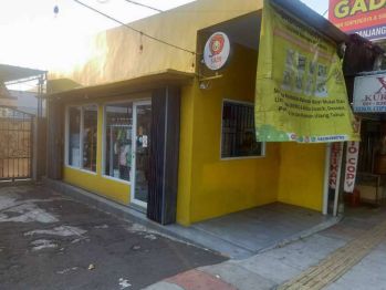 tanah dan bangunan komersil pinggir jalan raya