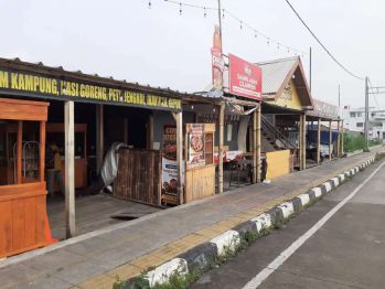 Over kontrak tempat usaha