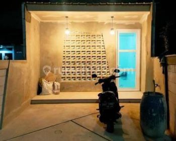 Rumah  bergaya industrial di tapos depok turun harga