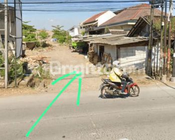 TANAH WOLTERMONGINSIDI 1001m PINGGIR JALAN RAYA MURAH SIAP BANGUN