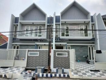 Rumah di Manyar tampotika model scandinavian