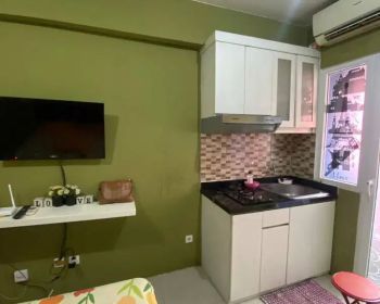 The green pramuka city apartemen studio furnish sewa tahunan