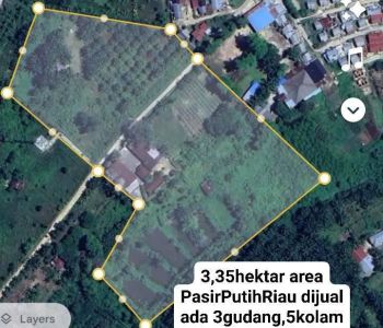 Tanah dengan gudang dan kolam
