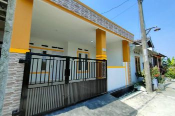 JUAL RUMAH SIAP HUNI LUAS TANAH 60 DI PERUMAHAN ALAM PESONA WAJANAYA BEKASI