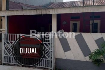 RUMAH MINIMALIS DI TENGAH KOTA