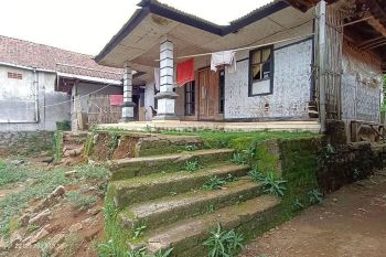 Tanah MURAH berikut bangunan pinggir jalan besar strategis