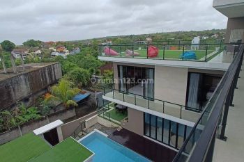 Indulge in coastal living with this captivating villa boasting panoramic ocean