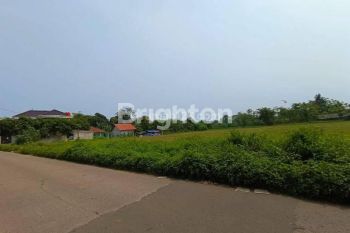 Tanah pinggir jalan raya sindang jaya dekat suvarna sutera