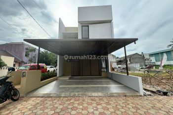Rumah Baru Modern Tropical di Cinangka Dengan Harga Menarik