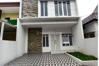 Rumah Dengan Rooftop  Siap Huni dalam Cluster Di Tanah Baru Beji Depok