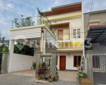 RUMAH SIAP HUNI ADA KOLAM RENANG DI MEDAN GATOT SUBROTO