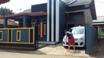 rumah di jalan kampung