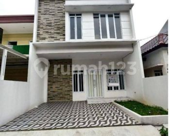 Rumah Dengan Rooftop  Siap Huni dalam Cluster Di Tanah Baru Beji Depok